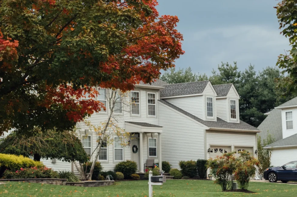 Suburban Home in Autumn Suburban home with autumn foliage